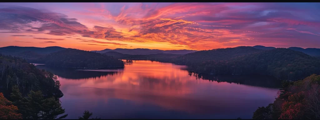 a breathtaking sunset paints the sky in vibrant hues of orange and purple, illuminating a serene lake surrounded by majestic mountains, reflecting the stunning colors in perfect harmony.